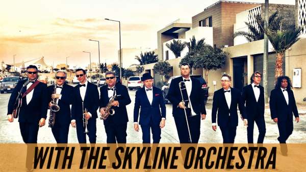 WITH THE SKYLINE ORCHESTRA